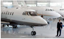 Aircraft at hangar with ground crew